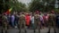 Ethiopian army soldiers attempt to control protestors from the capital and those displaced by ethnic-based violence over the weekend in Burayu, as they demonstrate to demand justice from the government in Addis Ababa, Ethiopia, Sept. 17, 2018. 