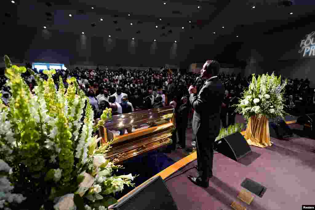 Senior pastor Dr. Remus Wright speaks during a funeral service for George Floyd at The Fountain of Praise church, June 9, 2020, in Houston. 