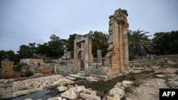 FILE - Water flows through the ruins at the site of the ancient Greco-Roman city of Cyrene (Shahhat) in eastern Libya, about 60 kilometres (37 miles) west of Derna, on September 21,2023, in the aftermath of a devastating flood.