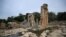 FILE - Water flows through the ruins at the site of the ancient Greco-Roman city of Cyrene (Shahhat) in eastern Libya, about 60 kilometres (37 miles) west of Derna, on September 21,2023, in the aftermath of a devastating flood.