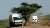 KENYA: Many African roads are seasonably impassable or in bad repair. A Red Cross truck travels on a dirt road, Monday, Feb. 12, 2007, outside the Kenyan town of Naivasha. Harvest losses are high due to poor roads. AP File photo.