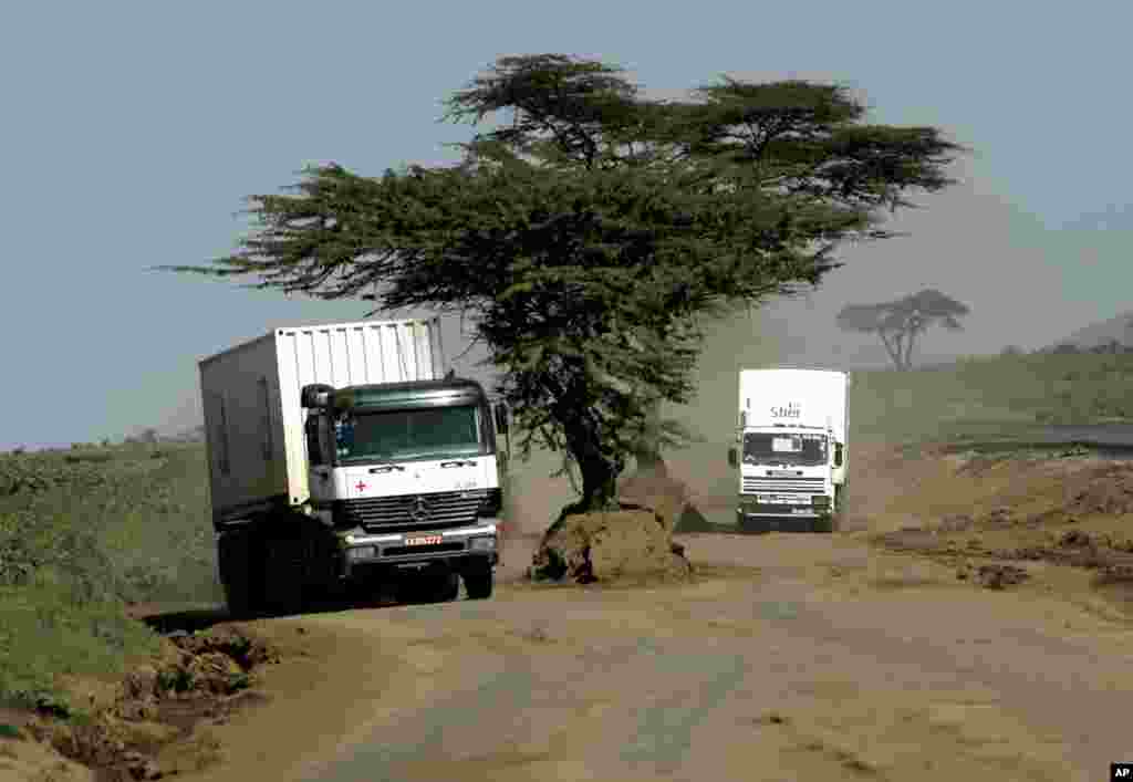 KENYA: Many African roads are seasonably impassable or in bad repair. A Red Cross truck travels on a dirt road, Monday, Feb. 12, 2007, outside the Kenyan town of Naivasha. Harvest losses are high due to poor roads. AP File photo.