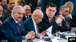 29 Mayıs 2018, Paris, Fransa - Soldan sağa, Mareşal Halife Haftar, Meclis Başkanı Salih İsa, Başbakan Fayez El- Sarraj, Libya Yüksek Devlet Konseyi Başkanı Halid el-Meşri