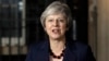 Britain's Prime Minister Theresa May delivers a speech outside 10 Downing Street in London, Nov. 14, 2018.