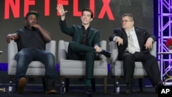 From left, Hannibal Buress, John Mulaney and Patton Oswalt seen at Netflix 2016 Winter TCA in Pasadena, Calif., Jan. 17, 2016.