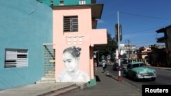 A painting by Cuban artist Maisel Lopez is seen on a street wall in Havana, Cuba, April 20, 2017. 