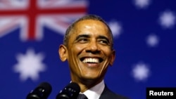 President Barack Obama smiles broadly as he takes the stage to speak at the University of Queensland in Brisbane, Australia, Nov. 15, 2014. Obama was in Brisbane for the G20 Summit.