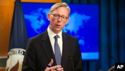 FILE - Brian Hook, U.S. special representative for Iran, speaks at the State Department, in Washington, Aug. 16, 2018.