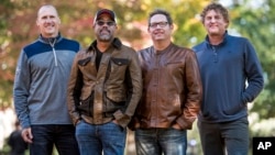 Jim Sonefeld, from left, Darius Rucker, Dean Felber, and Mark Bryan, of Hootie & the Blowfish, pose for a portrait at the University of South Carolina in Columbia, S.C., Nov. 16, 2018.