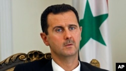FILE - Syrian President Bashar Assad, Aug. 19, 2009.