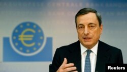 FILE - European Central Bank President Mario Draghi addresses the monthly ECB news conference in Frankfurt.