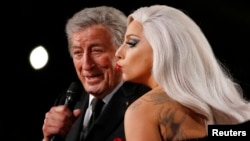 FILE - Lady Gaga performs "Cheek to Cheek" with Tony Bennett at the 57th annual Grammy Awards in Los Angeles, California, Feb. 8, 2015. 