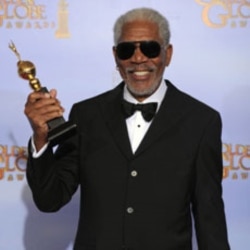 Actor Morgan Freeman poses backstage with the Cecil B. Demille Award during the 69th Annual Golden Globe Awards Sunday, Jan. 15, 2012, in Los Angeles