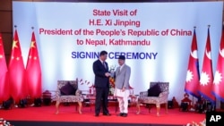中国国家主席习近平和尼泊尔总理奥利在加德满都举行双边会晤。(2019年10月13日)