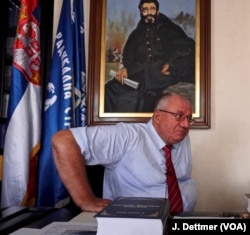 Serbia’s main opposition leader Vojislav Šešelj is engaged on a monumental three-volume work proving that the 1995 Srebrenica massacre of more than 8,000 Bosniaks, mainly men and boys, wasn’t an act of genocide by Serbs. He does admit it was a war crime.