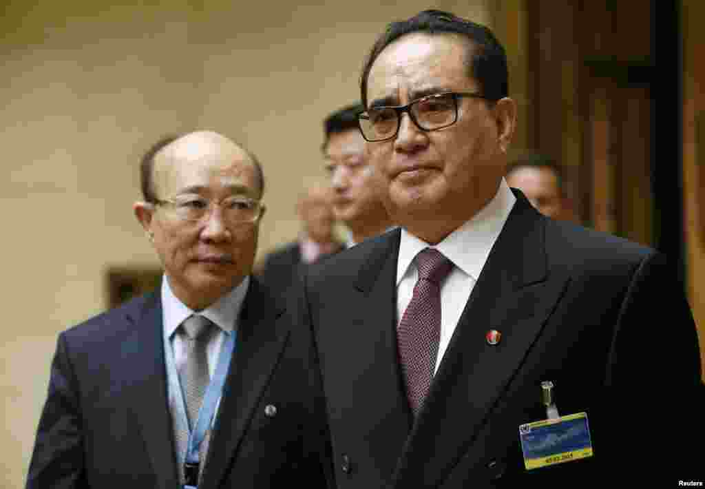North Korean Foreign Minister Ri Su Yong (right) arrives with North Korean ambassador to the United Nations So Se Pyong for his address to the Conference on Disarmament at the U.N. in Geneva March 3, 2015.