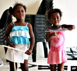 Two young students in Ntonga Music School in South Africa