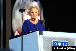 FILE - Former U.S. Secretary of State Madeleine Albright addresses the crowd on day two of the Democratic National Convention in Philadelphia, July 26, 2016 (A. Shaker/VOA)
