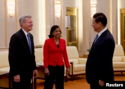 From left, U.S. Ambassador to China Max Baucus and U.S. National Security Adviser Susan Rice meet with Chinese President Xi Jinping in the Great Hall of the People in Beijing Sept. 9, 2014.