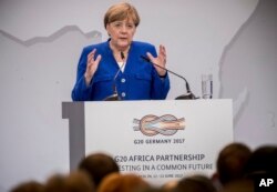 German chancellor Angela Merkel delivers a speech during the conference 'G20 Africa Partnership – Investing in a Common Future' in Berlin, June 12, 2017.