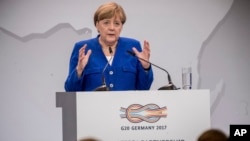 German chancellor Angela Merkel delivers a speech during the conference 'G20 Africa Partnership – Investing in a Common Future' in Berlin, June 12, 2017. 