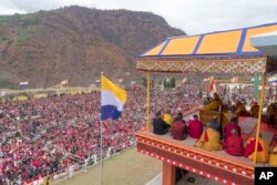 FILE - Tibetan spiritual leader the Dalai Lama delivers teachings at the Thupsung Dhargyeling Monastery in Dirang, Arunachal Pradesh, India, April 6, 2017.