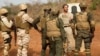 (FILE) Counter terrorism advisor talks to Niger soldiers at the range, Bob-Dioulasso, Burkina Faso, Feb, 21,2019.