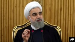 FILE - Iranian President Hassan Rouhani.