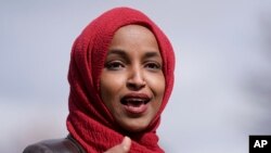 FILE - In this April 20, 2021, photo, Rep. Ilhan Omar, D-Minn., speaks in Brooklyn Center, Minn.