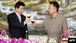 FILE - South Korean President Roh Moo-Hyun, left, and North Korean Leader Kim Jong-Il toast after signing the peace declaration during the two Korea Summit in Pyongyang, North Korea, Oct. 4, 2007.