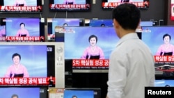 A man in South Korea watches TV sets showing a North Korean news report on the country's fifth nuclear test on September 9. The test was North Korea's second this year. The first was on January 6.