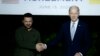 Ukrainian President Volodymyr Zelensky (L) and US President Joe Biden sign a bilateral security agreement during a press conference at the Masseria San Domenico on the sidelines of the G7 Summit hosted by Italy in Apulia region, on June 13, 2024 in Savell