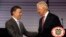 U.S. Vice President Joe Biden, right, shakes hands with Colombia's President Juan Manuel Santos after giving a joint news conference at the presidential palace in Bogota, Colombia, June 18, 2014