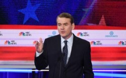 Democratic presidential hopeful U.S. Senator for Colorado Michael Bennet speaks in the second Democratic primary debate of the 2020 presidential campaign at the Adrienne Arsht Center for the Performing Arts in Miami, June 27, 2019.