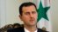 FILE - Syrian President Bashar Assad, Aug. 19, 2009.