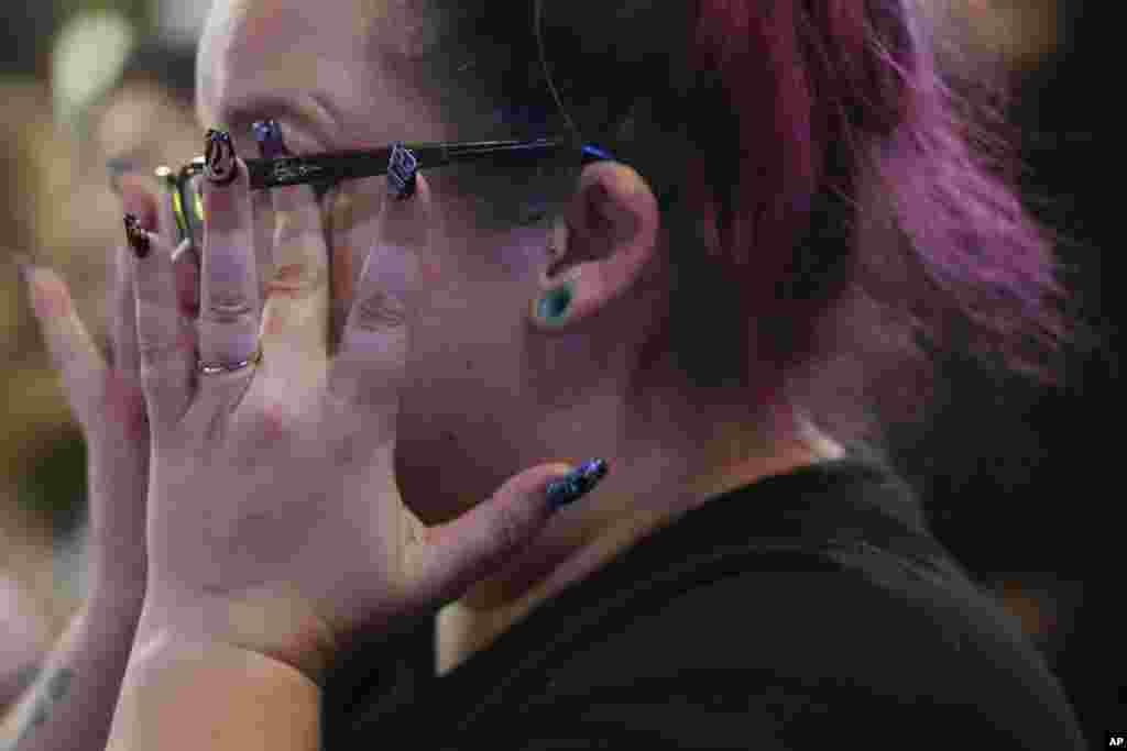 Emmie Reed, center, co-founder of Bans Off Our Bodies Florida collective, wipes away tears after Florida&#39;s Amendment 4, which would have enshrined abortion rights in the state, fell short of the 60% vote threshold required to pass, during a watch party for the Yes On 4 campaign, on Election Day, Nov. 5, 2024, in St. Petersburg.