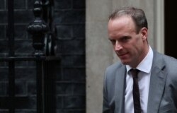 FILE - Britain's Foreign Secretary Dominic Raab is seen outside Downing Street in London, Britain, Oct. 24, 2019.