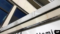 FILE - A sign marks the building of the International Atomic Energy Agency, IAEA, in Vienna, Austria, March 5, 2013.