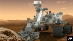 This artist's rendering provided by NASA shows the Curiosity rover on the surface of Mars. (AP/NASA)