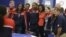 First lady Michelle Obama poses with members of Team USA, 2012 Summer Olympics, London, July 27, 2012.