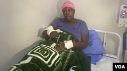 Zimbabwe activist Cecilia Chimbiri in a clinic in Harare in May 2020 after being allegedly tortured by state security agents. (Columbus Mavhunga/VOA)