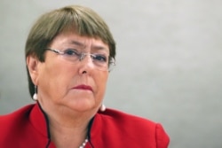 FILE - United Nations High Commissioner for Human Rights Michelle Bachelet attends a session of the Human Rights Council at the United Nations in Geneva, Switzerland, Feb. 24, 2020.