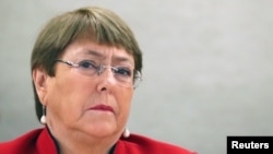 FILE - U.N. High Commissioner for Human Rights Michelle Bachelet attends a session of the Human Rights Council at the United Nations in Geneva, Switzerland, Feb. 24, 2020.