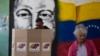 Un hombre deposita su voto como parte de un ensayo para las elecciones presidenciales del 28 de julio en un centro de votación en Caracas, Venezuela, el domingo 30 de junio de 2024. [Foto: Archivo/AP]