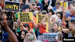 People protest in support of Philando Castile during a rally on the capitol steps after a jury found St. Anthony Police Department officer Jeronimo Yanez not guilty of second-degree manslaughter in the death of Castile, in St. Paul, Minnesota, June 16, 2017.