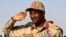FILE - General Mohammed Hamdan Dagalo salutes during a rally in Galawee, Sudan, on June 15, 2019. The United States announced on Jan. 7, 2025, sanctions on Dagalo, also known as Hemedti, that bar him from traveling to the U.S. and freeze any U.S. assets he might hold.