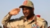 FILE - Rapid Support Forces leader Mohammad Hamdan Daglo Mousa salutes during a rally in Galawee, Sudan, June 15, 2019. Daglo, of Darfur, is widely known as Hemedti and on Jan. 7, 2024, was placed under U.S. sanctions.