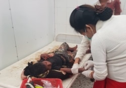 A nurse attends to a boy injured by a blast in Buthidaung township, in Myanmar's Rakhine state, Jan. 7, 2020. (Photo provided to VOA by source who requested not to be identified)