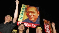 Protesters in Hong Kong call for the release of Chinese dissident Liu Xiaobo Friday