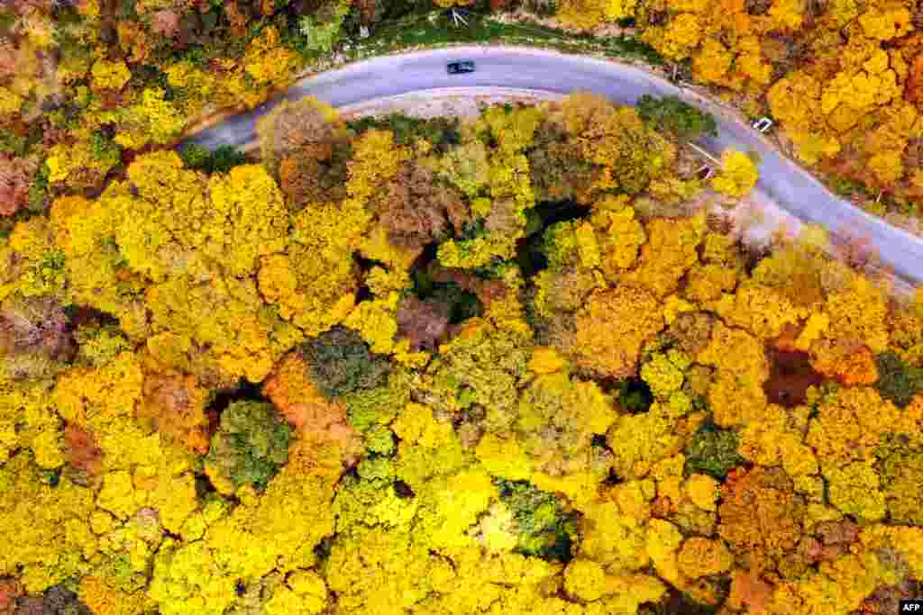 An aerial image shows a car moving along a road near the village of Martkopi, outside Tbilisi, Georgia.